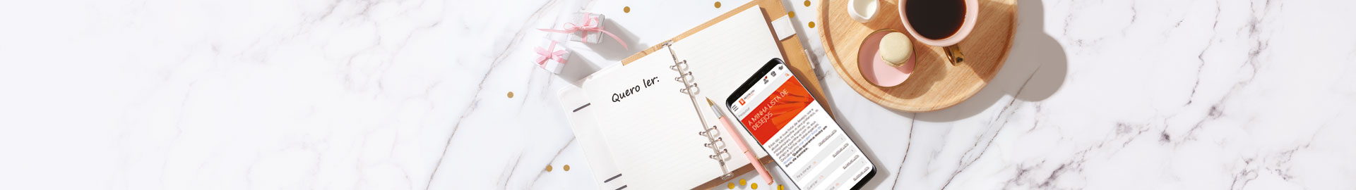 Fundo mármore, com uma agenda aberta a dizer 